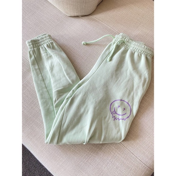 Divided Mint green joggers with purple smiley face, size XS - Picture 6 of 7